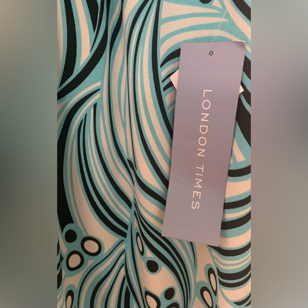 Abstract Patterned Dress Trimmed In Black - Picture 6 of 7